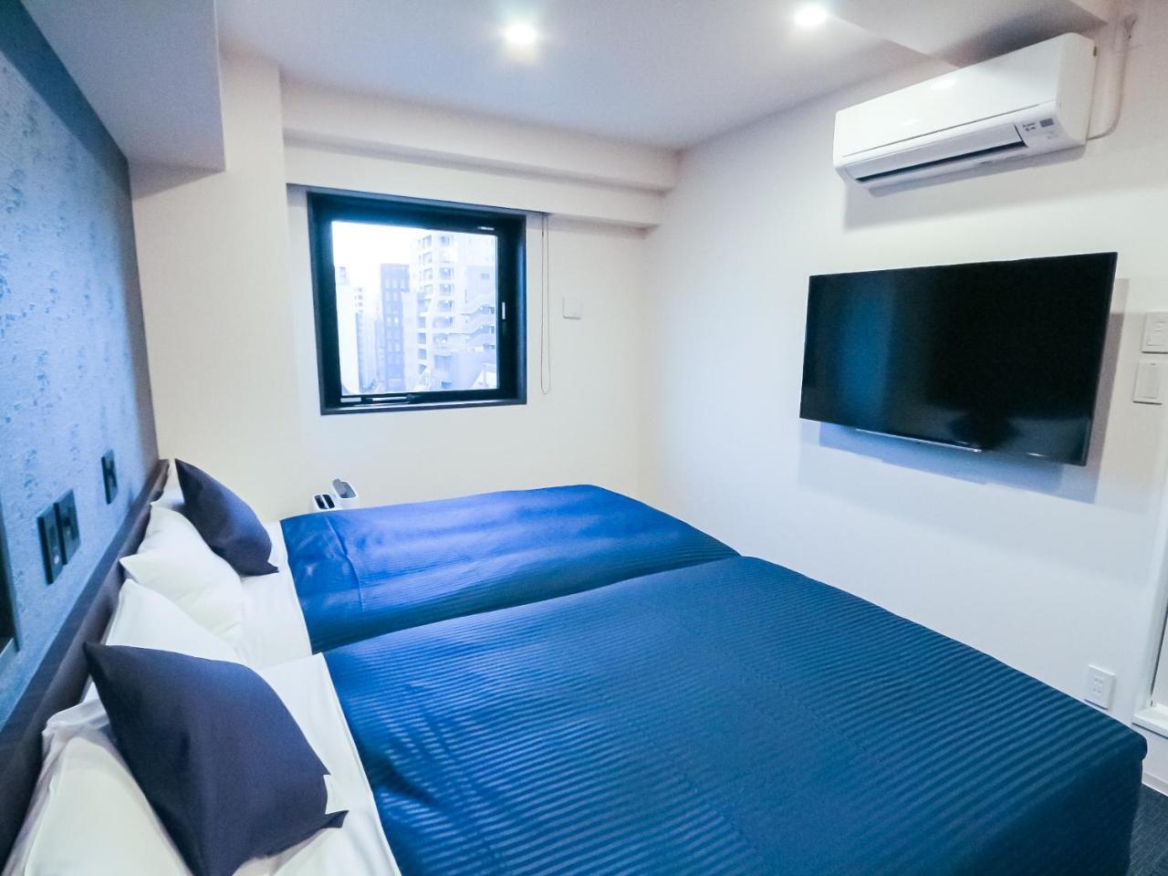 Hotel Livemax Tokyo Shintomicho Extérieur photo