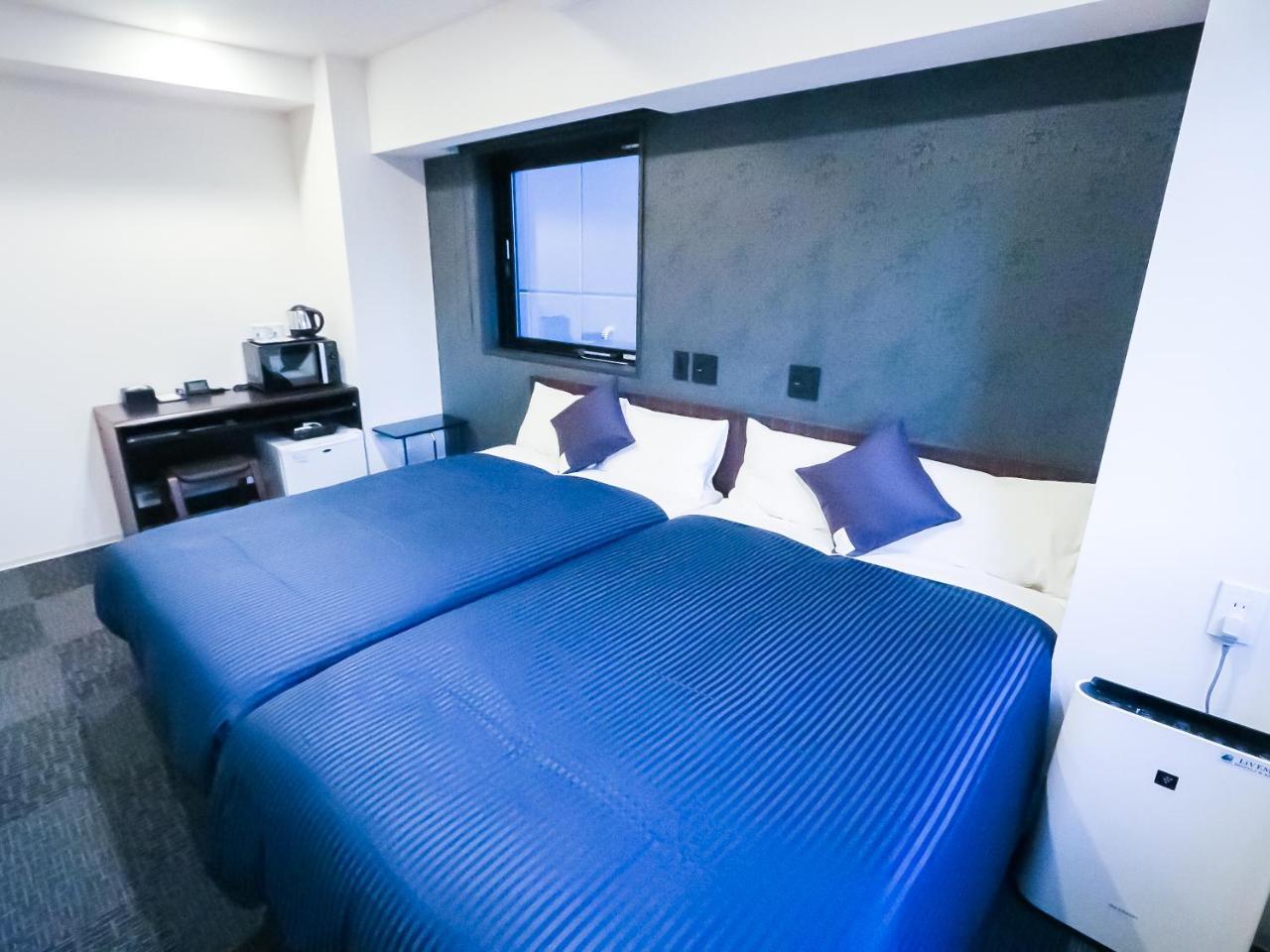 Hotel Livemax Tokyo Shintomicho Extérieur photo